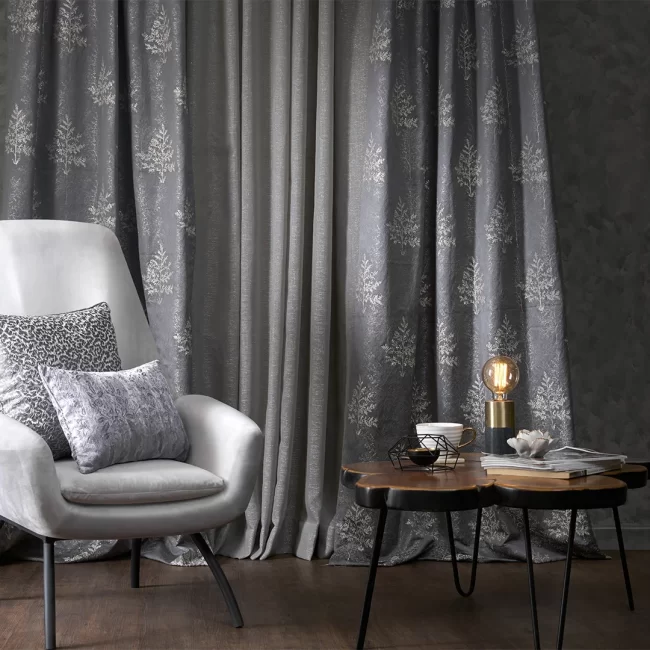 White chair with grey cushion and coffee table