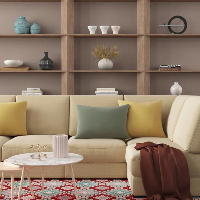 Beige sectional sofa with pastel cushions