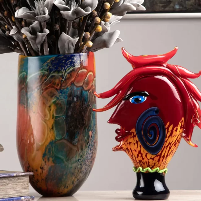 Multicolor artistic vase with abstract figurine