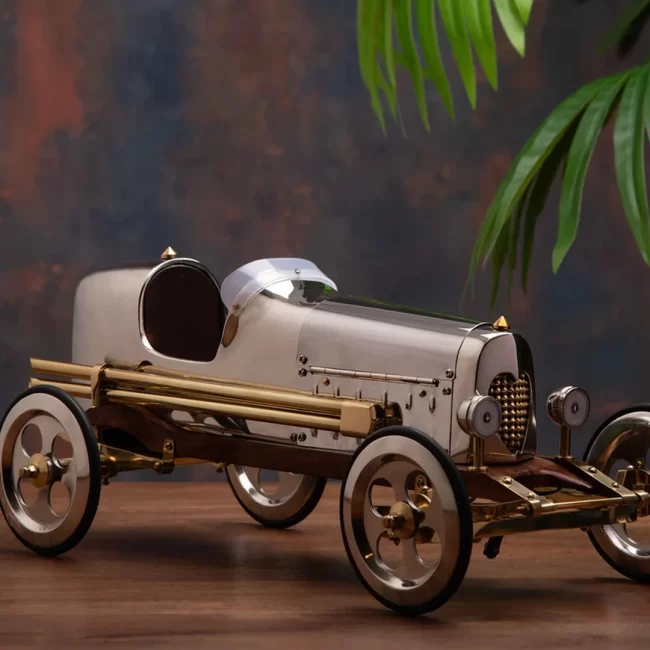 Vintage silver car decor piece in drape shoppe