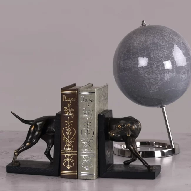 Black dog bookend with grey globe